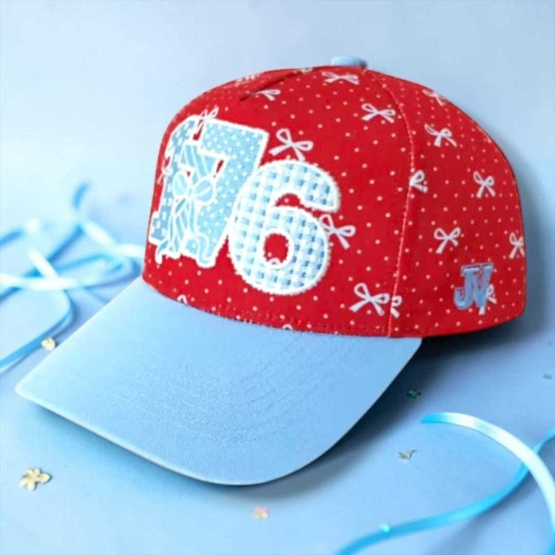 Red cap with bows and a blue brim for Independence Day 4th of July 1776
