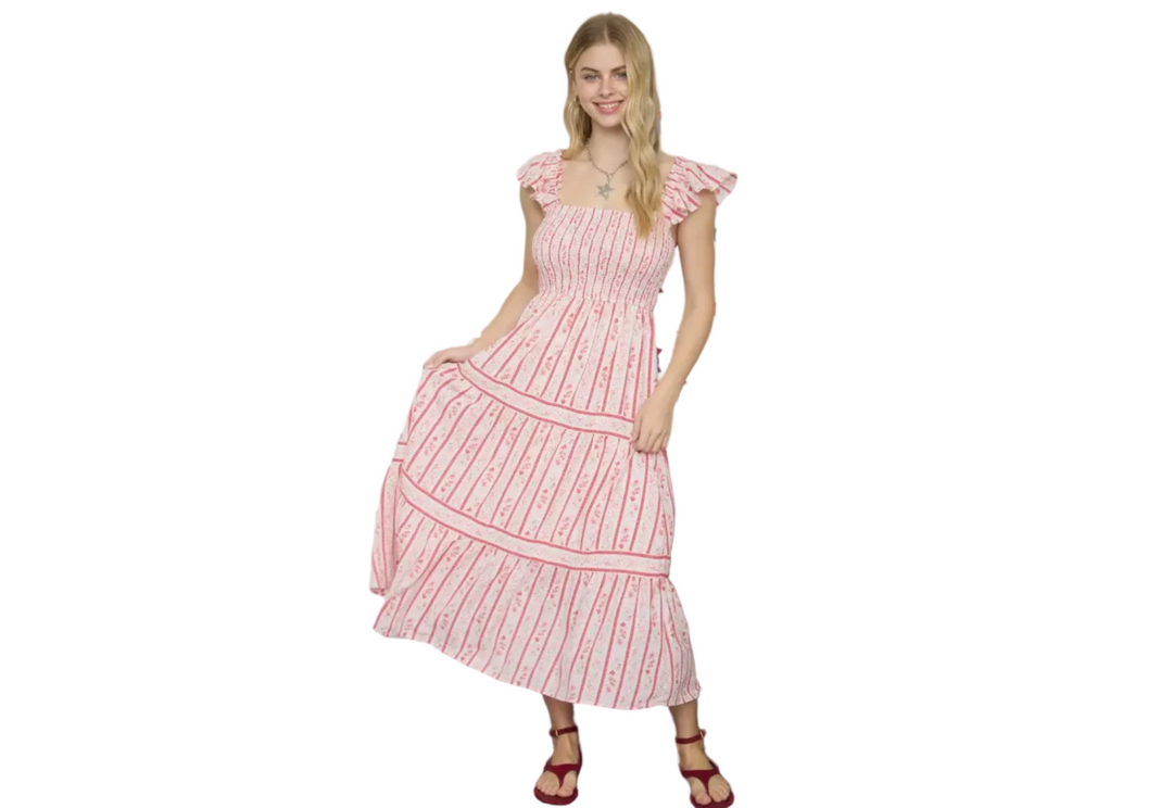 Woman wearing a pink striped smocked floral dress for Easter

