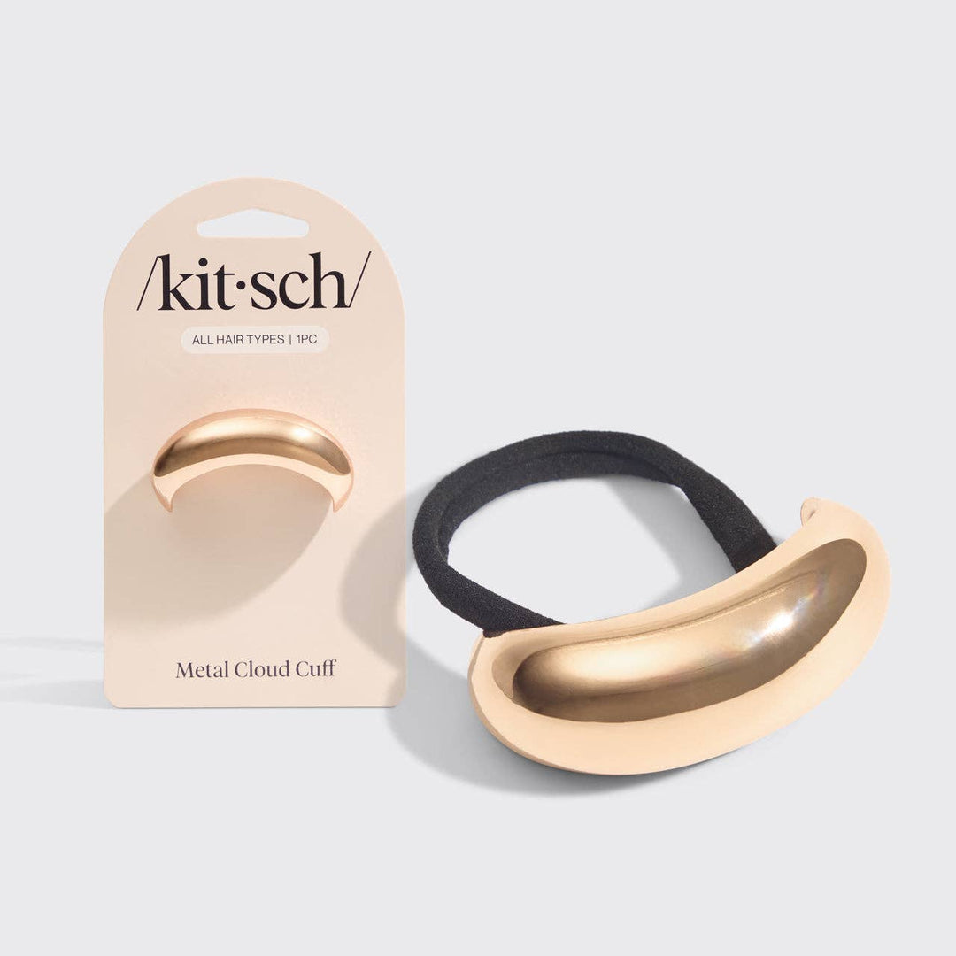 Metal cloud cuff with black hair tie on a white background, featuring the 'kitsch' brand.