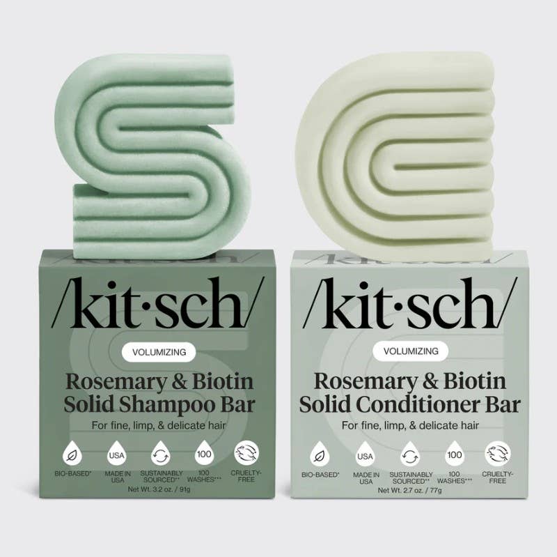 Two Kitsch solid shampoo and conditioner bars on a white background