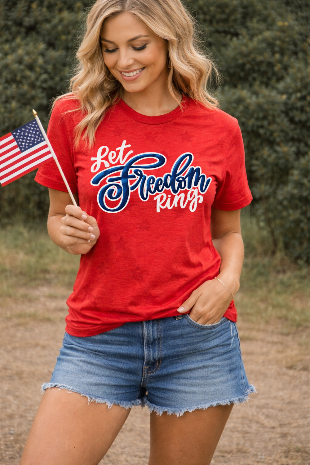 Blue Let Freedom Ring patriotic tee with star print styled with denim shorts and red sneakers