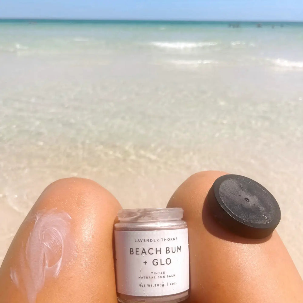 Lavender Thorne Beach Bum + Glo tinted natural sun balm for glowing, sun-kissed skin in glass jar