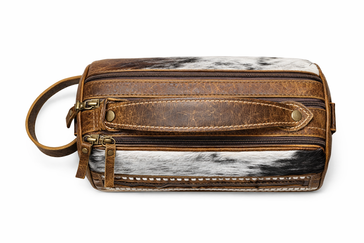 Cowhide dopp kit with zipper compartments top view