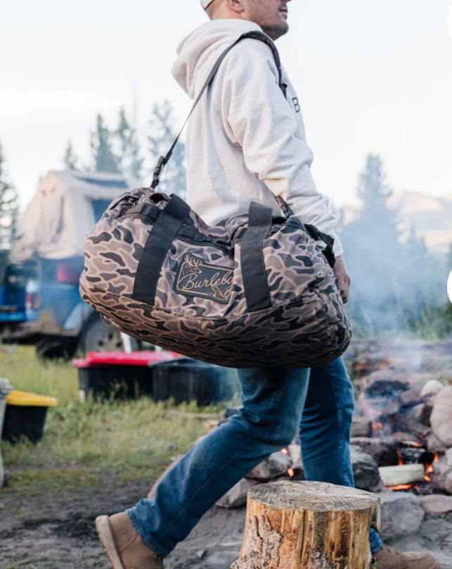 Burlebo Gauge Camo duffel bag with adjustable shoulder strap and spacious main zipper compartment