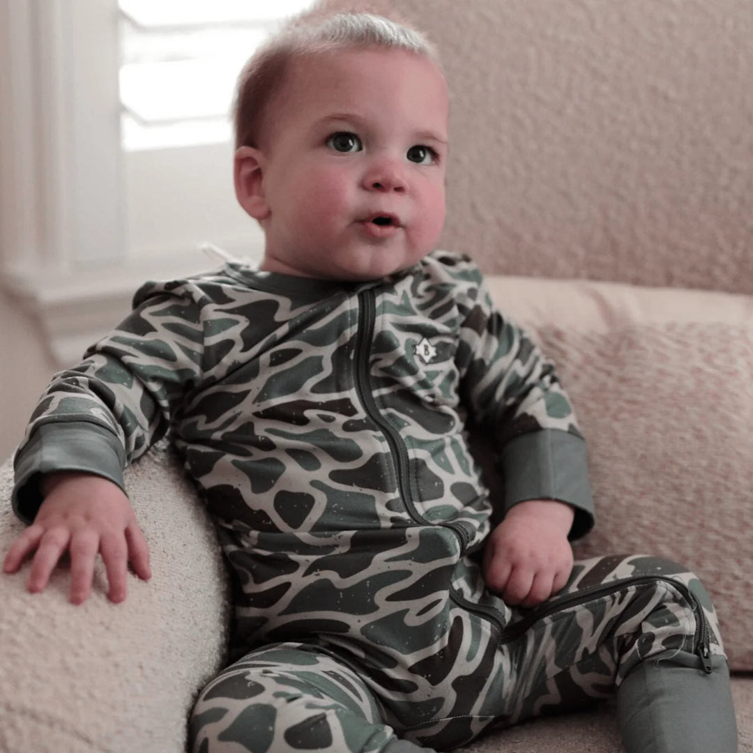 Burlebo baby zip up romper in Retro Camo with fold-over cuffs and full zipper baby