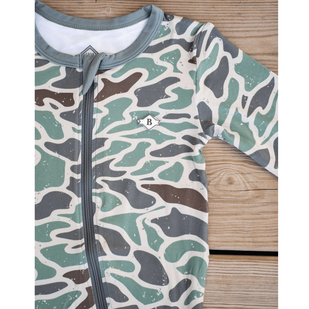 Burlebo baby zip up romper in Retro Camo with fold-over cuffs and full zipper front