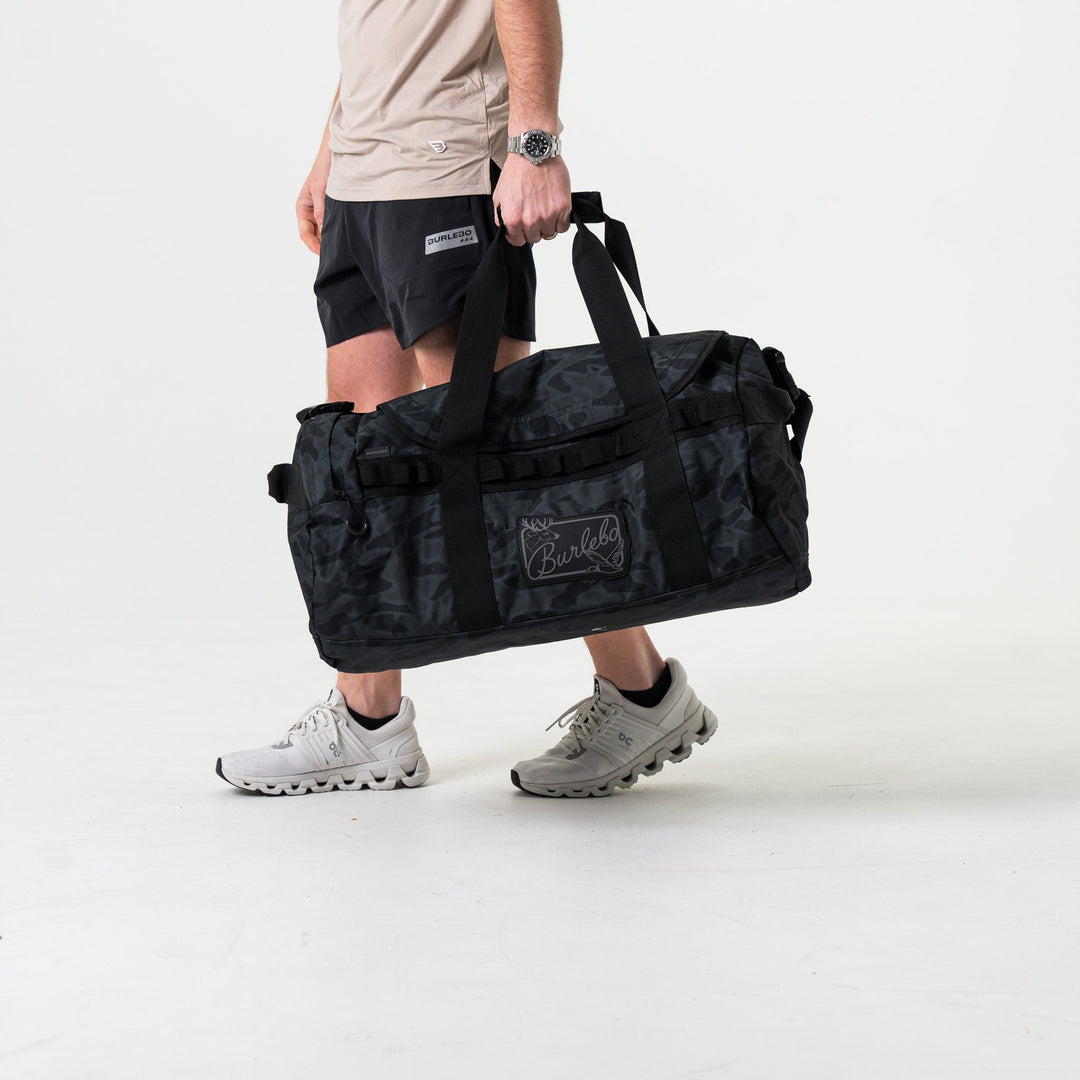 Burlebo Black Camo duffel bag with adjustable shoulder strap and spacious main zipper compartment
