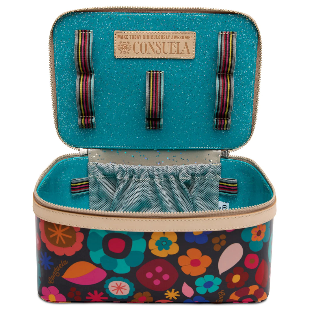 Open Consuela Amelie Train Case showing brush holders, mesh pocket, and wipeable interior