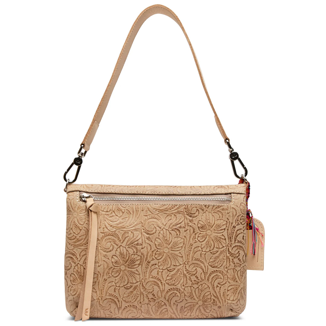 Back view of tan tooled leather Consuela Metro Crossbody bag
