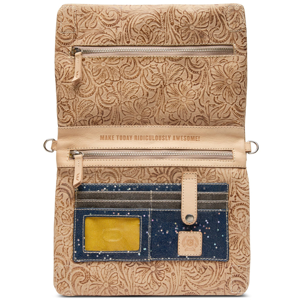 Interior view of Consuela Lawton Metro Crossbody showing compartments and card slots