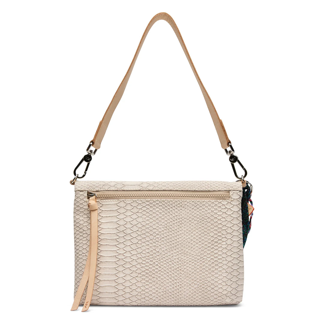 Back view of Consuela Metro Crossbody Thunderbird with neutral snake texture and zipper pocket