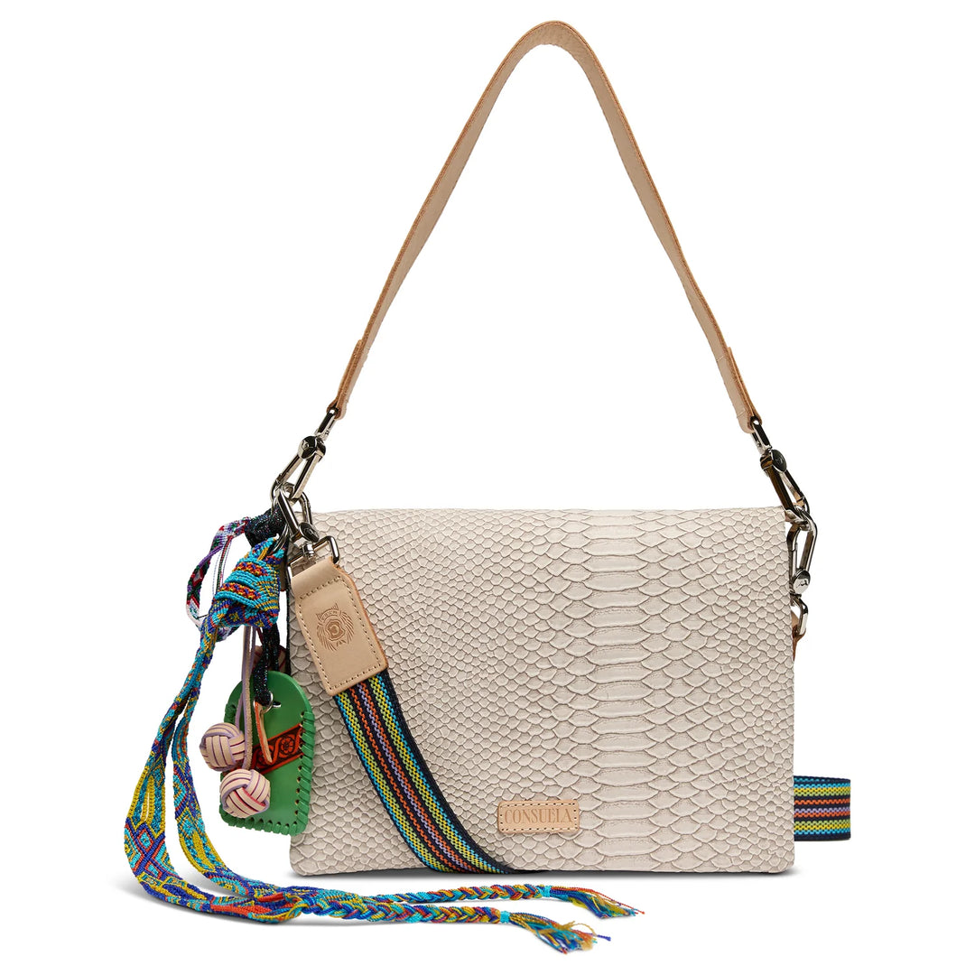 Front view of Consuela Metro Crossbody Thunderbird featuring textured neutral exterior and adjustable strap