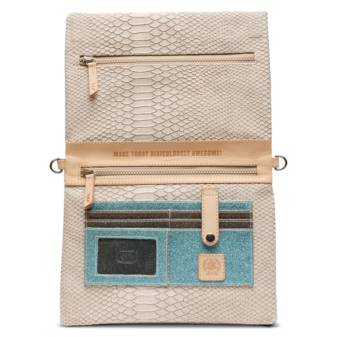 Interior view of Consuela Metro Crossbody Thunderbird showing card slots, zipper pockets, and ID window