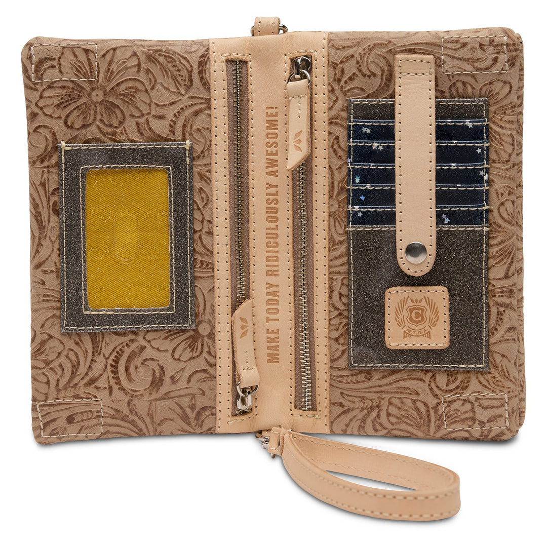 Interior view of Consuela Uptown Crossbody showing card slots, ID window, and zipper compartments