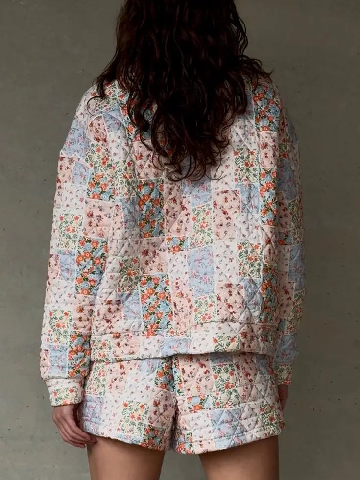 Back view of the Judy Quilted Floral Short Set with quilted floral patchwork crewneck and matching shorts.