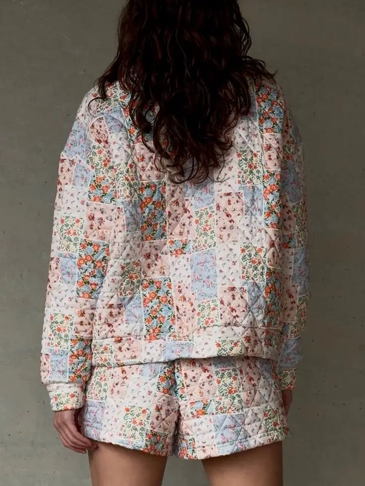 Back view of the Judy Quilted Floral Short Set with quilted floral patchwork crewneck and matching shorts.
