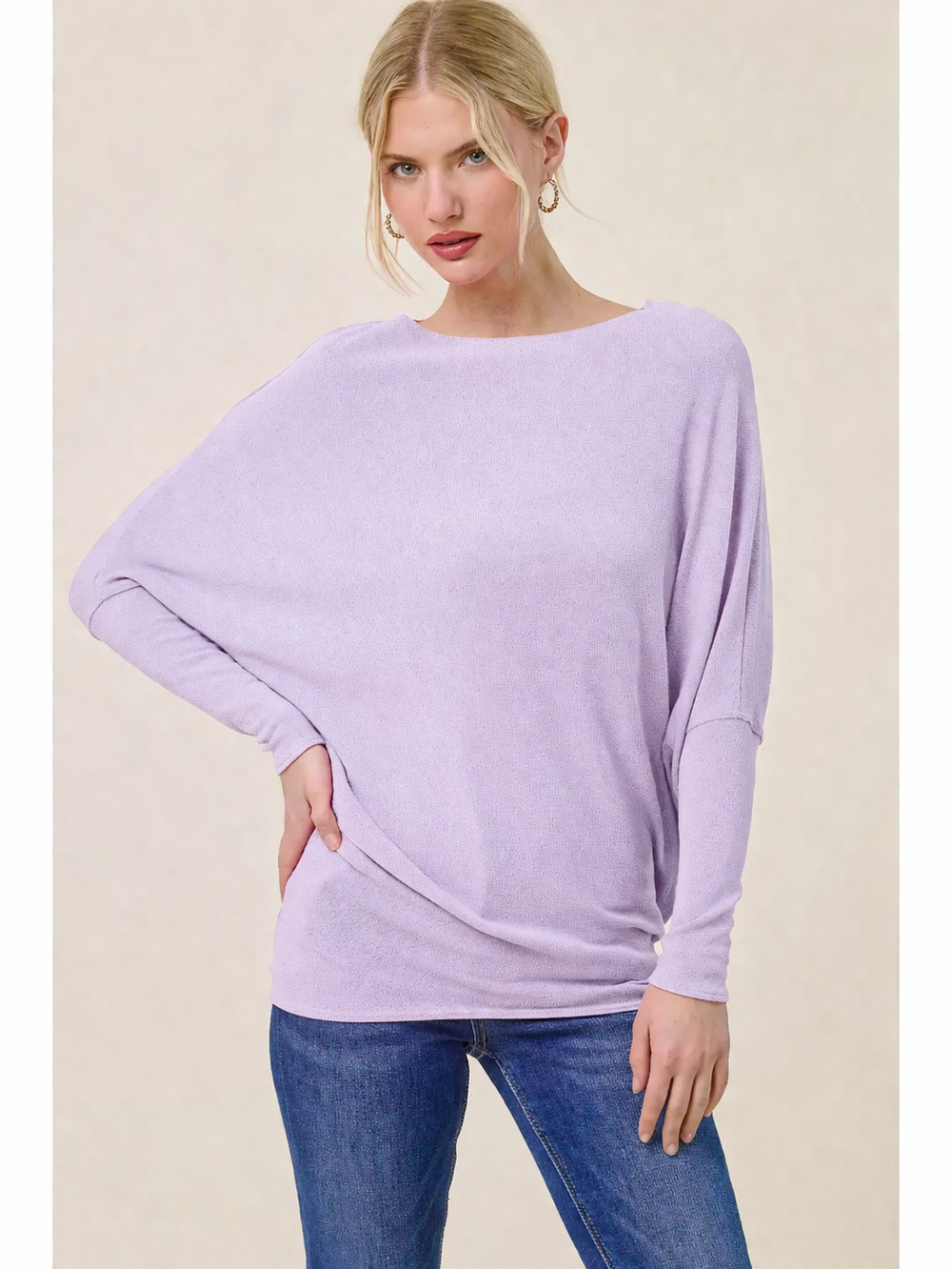 Front view of lavender dolman sleeve top with relaxed fit and soft fabric