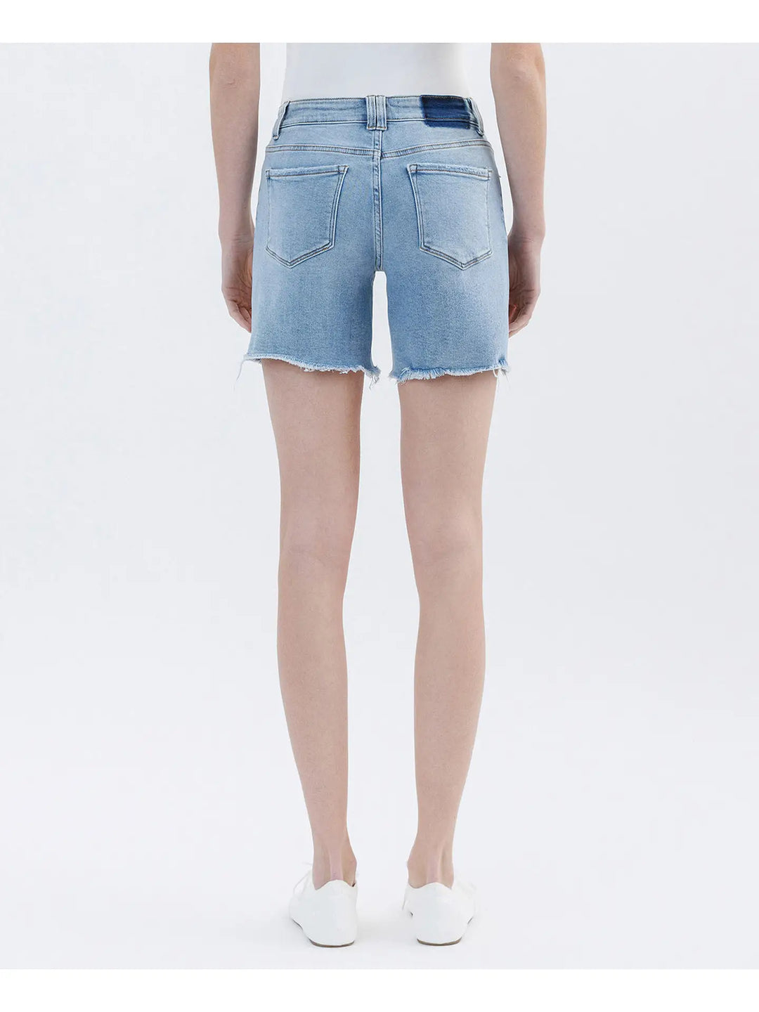 Back view of Lovervet by Vervet high rise raw hem midi denim shorts in a light wash