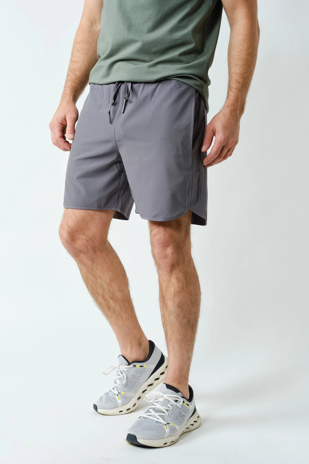 Side view of men’s gray athletic shorts with lightweight performance fabric