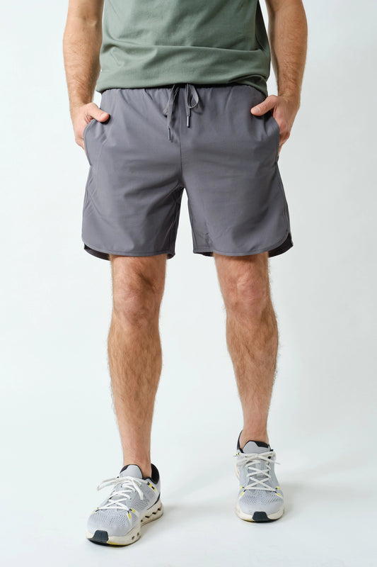 Men’s gray performance shorts front view with drawstring waistband and athletic fit