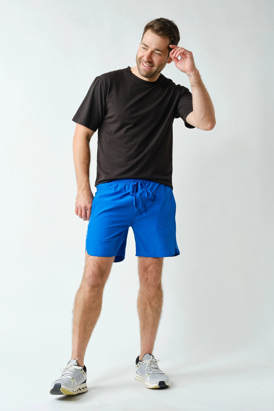 Men’s performance shorts styled with athletic tee for casual activewear outfit