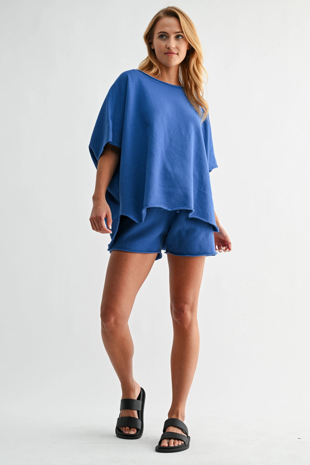 Blue Mono B lounge shorts styled with matching oversized top casual set