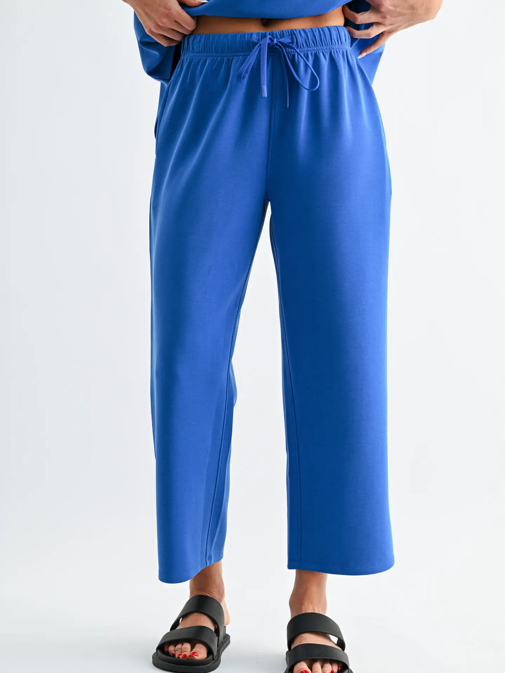 Mono B Laguna Casual Comfort Set featuring cropped wide-leg pants with drawstring waist in a vibrant blue buttery-soft modal fabric.