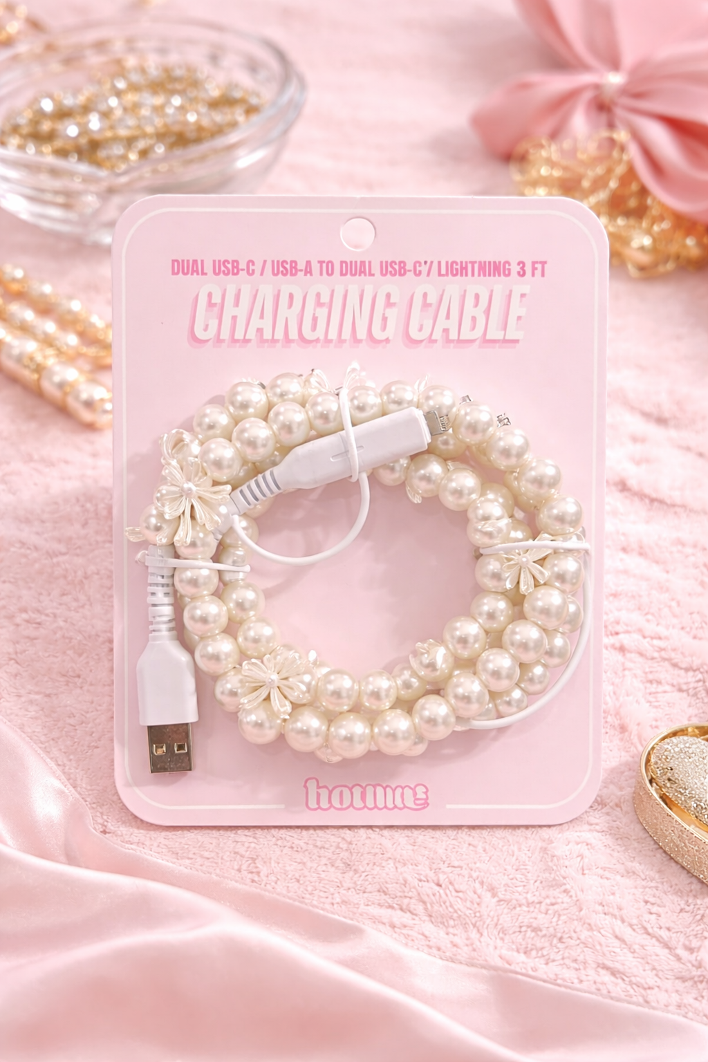 pearl beaded charging cable with bow details on pink background boutique aesthetic phone charger