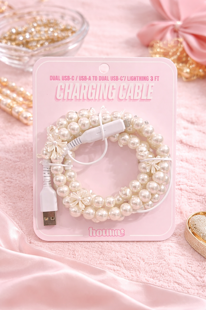pearl beaded charging cable with bow details on pink background boutique aesthetic phone charger