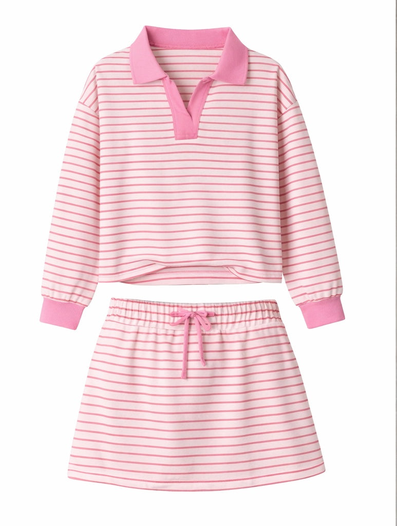 Pink striped collared long sleeve top and skirt matching lounge set laid flat on white background