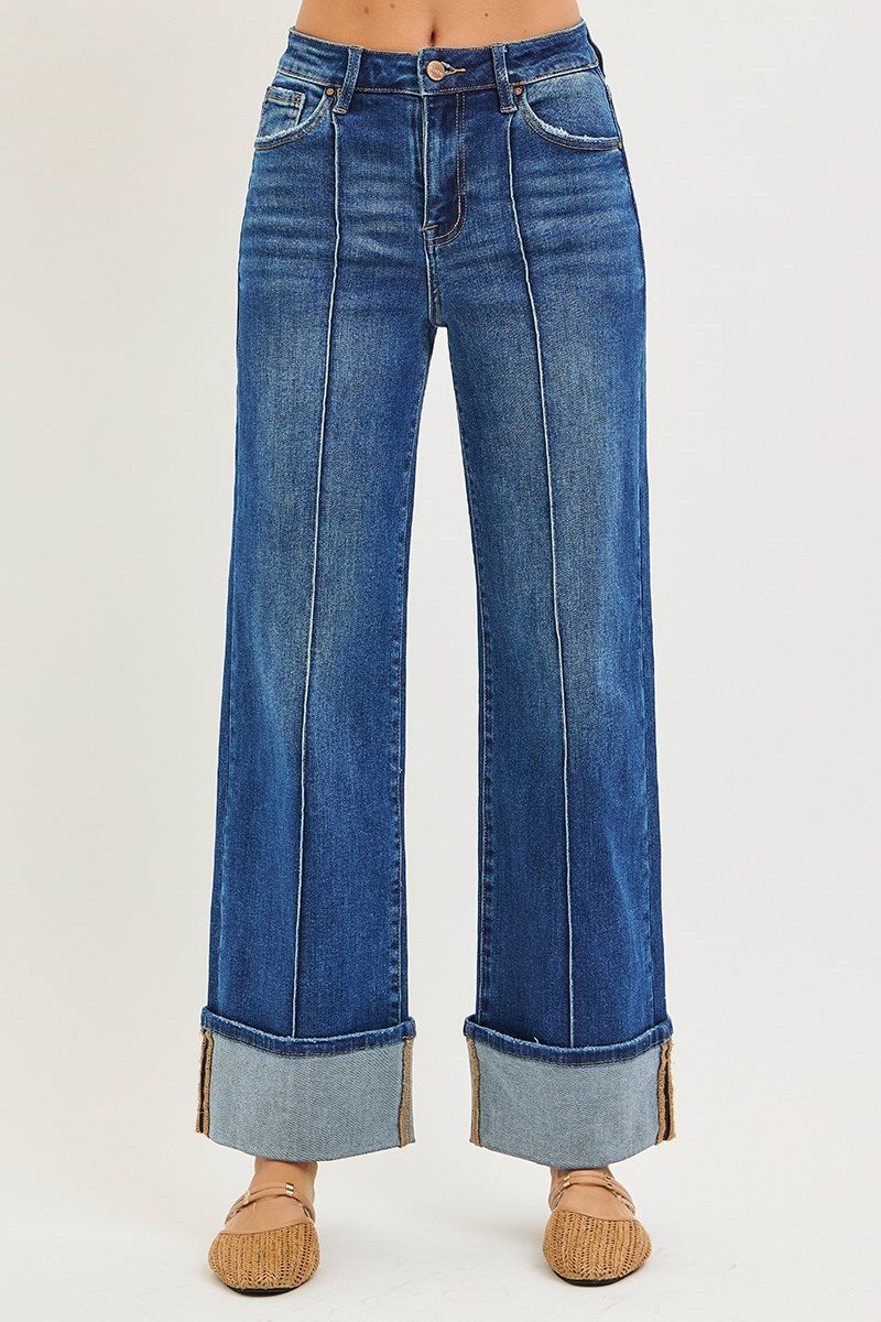 Close-up front view of Risen High Rise Ankle Wide Turn Up Jeans highlighting the center seam detail, high-rise waist, and oversized turned-up cuffs.