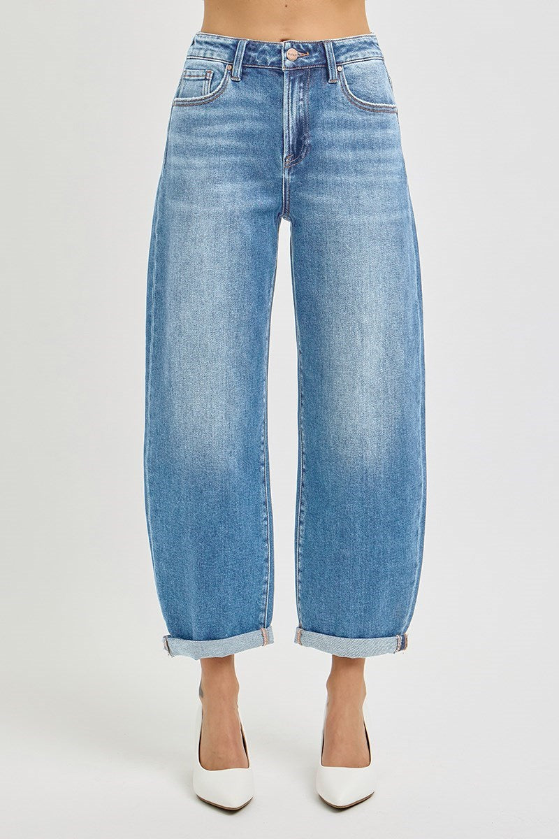 Front view of Risen High Rise Crop Mild Barrel Jeans in a light wash featuring a cuffed hem and trendy barrel leg design.