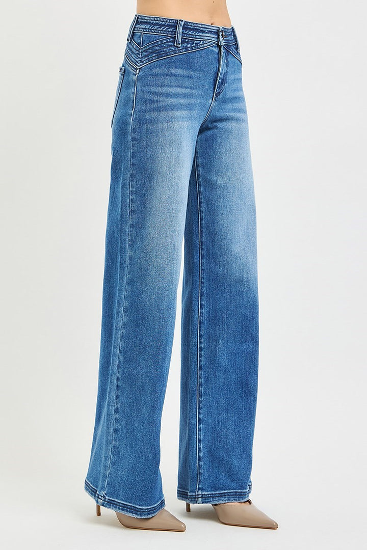 Side view of Risen High Rise Wide Leg Waist Detail Jeans showcasing the relaxed wide leg fit.