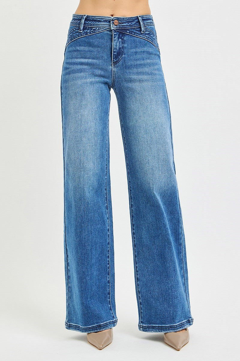 Front view of Risen High Rise Wide Leg Waist Detail Jeans in a medium wash featuring a flattering high-rise fit and relaxed wide leg silhouette.