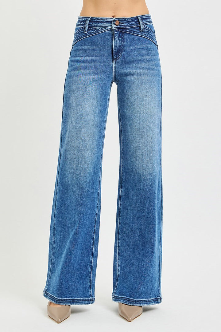 Front view of Risen High Rise Wide Leg Waist Detail Jeans in a medium wash featuring a flattering high-rise fit and relaxed wide leg silhouette.